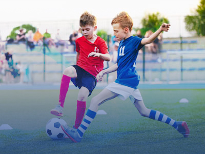 boys_soccer400x300_blue 2 boys playing soccer